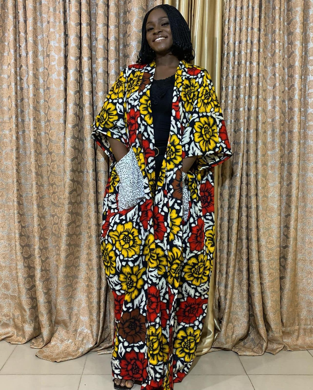 A woman in the ADALI Ankara dress